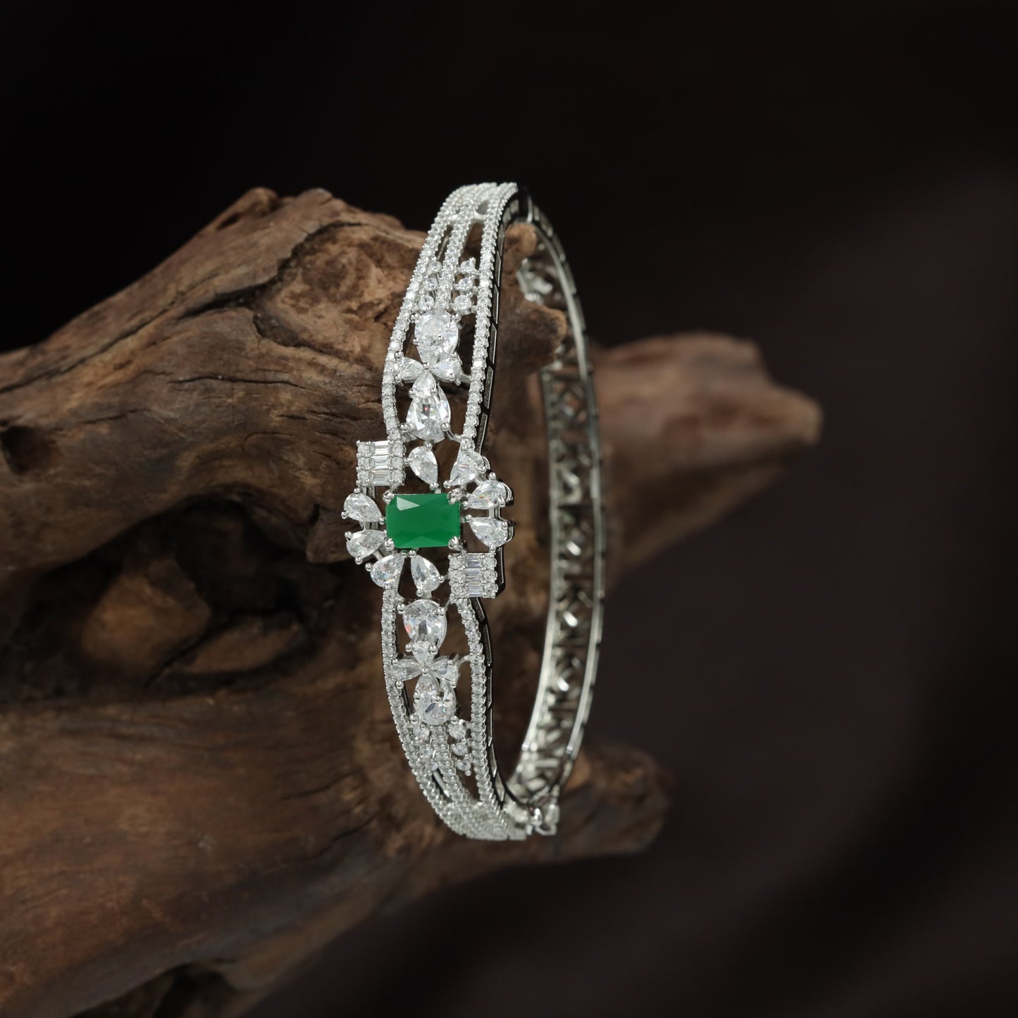 Open Frame Kada with Emerald Cut Centrepiece and Floral Detailing
