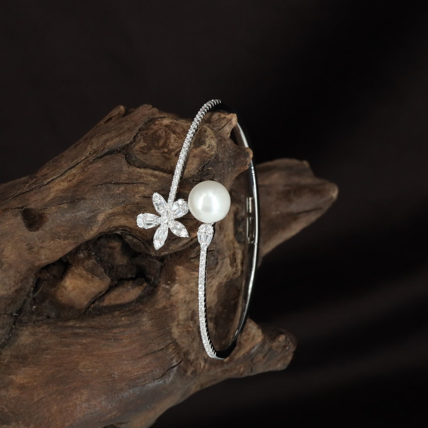 Petal Twist Kada with Floral Accent Placement and Sleek Open Cuff Shape