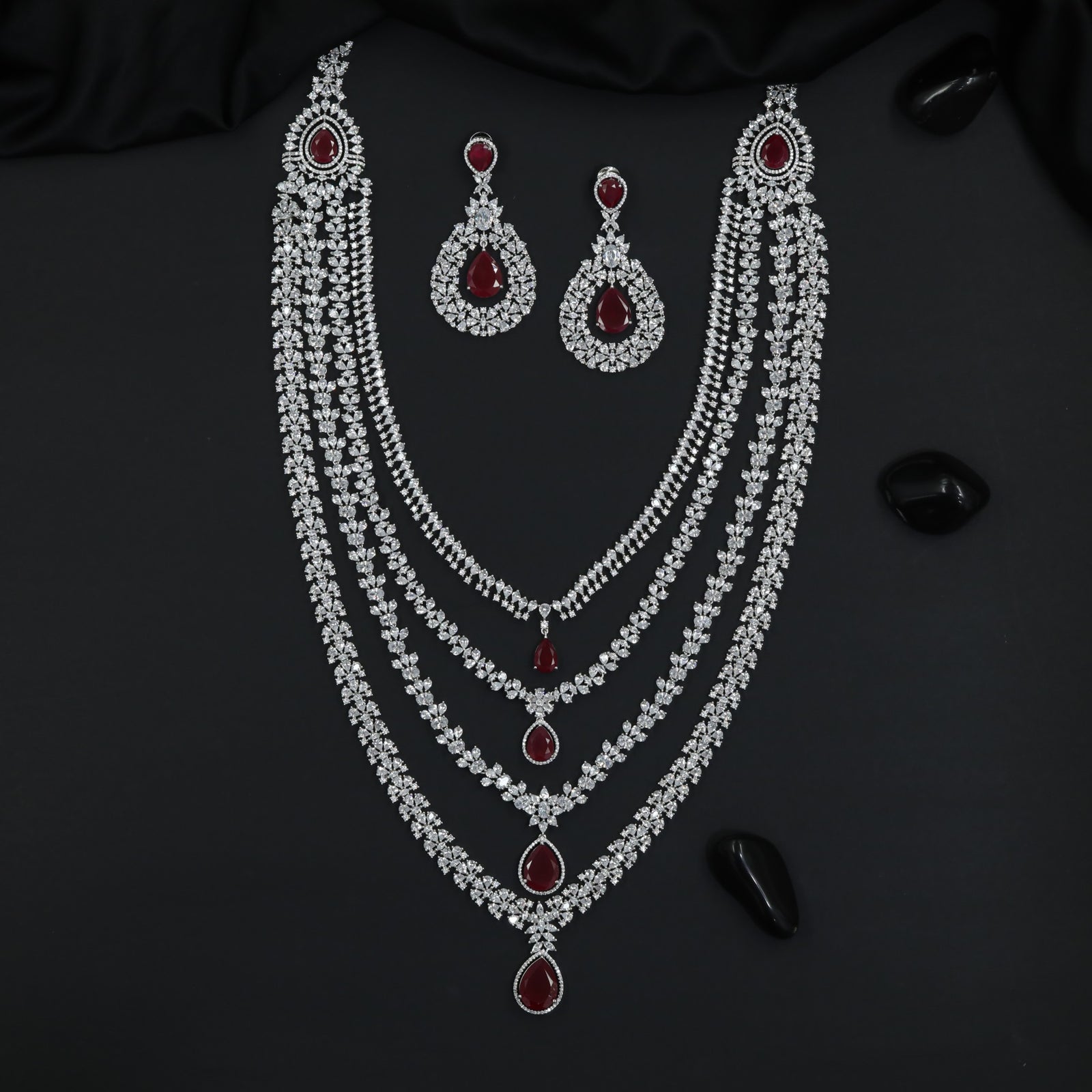 Bridal wear long haara with layered drape design and danglers