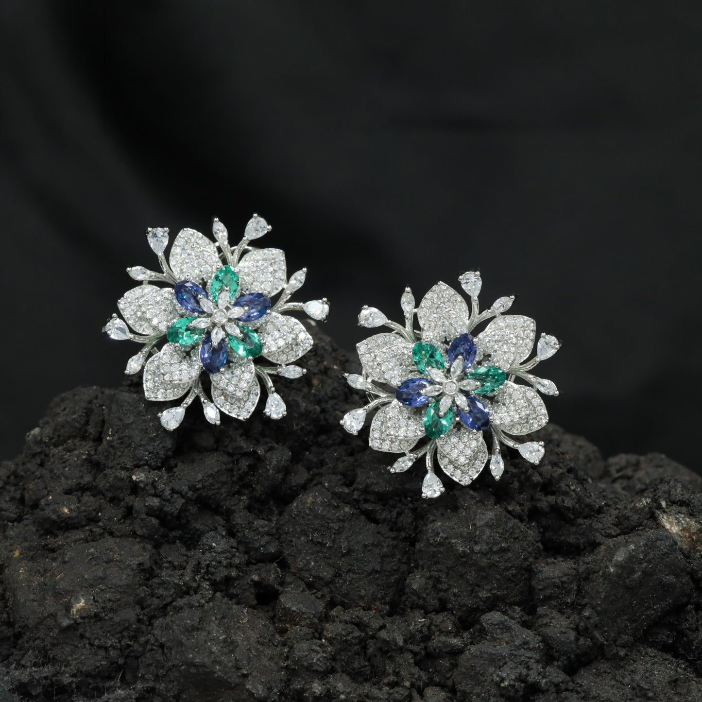 Botanical Rhodium Studs with Intricate Floral Petals and Leaf Details