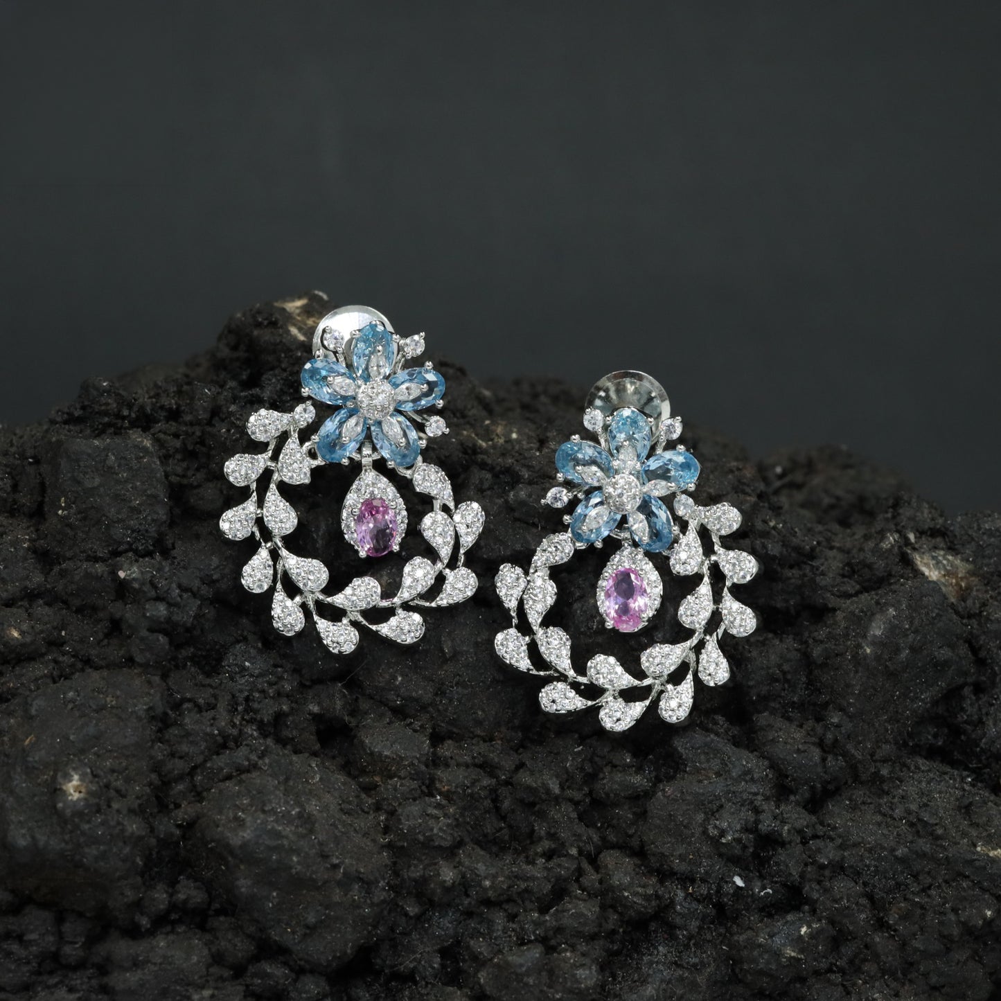 Occasion Exclusive Rhodium Stud Designed Around a Flower Cluster and Open Leaf Structure