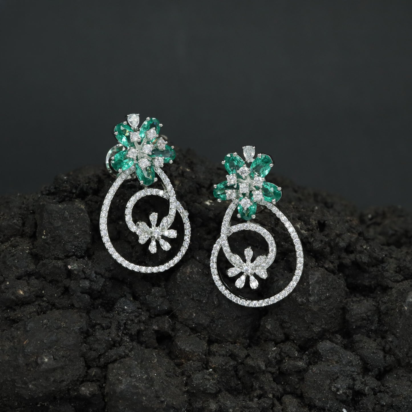 Grand Exclusive Rhodium Stud Featuring an Elongated Open Frame and Sculpted Inner Bloom