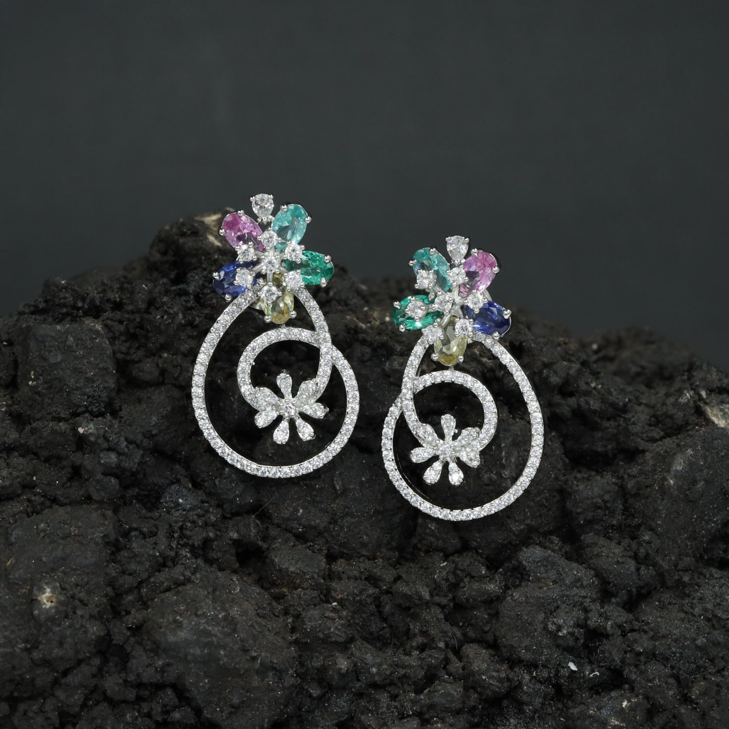 Couture Exclusive Rhodium Stud Featuring Twin Floral Clusters and Openwork Drops