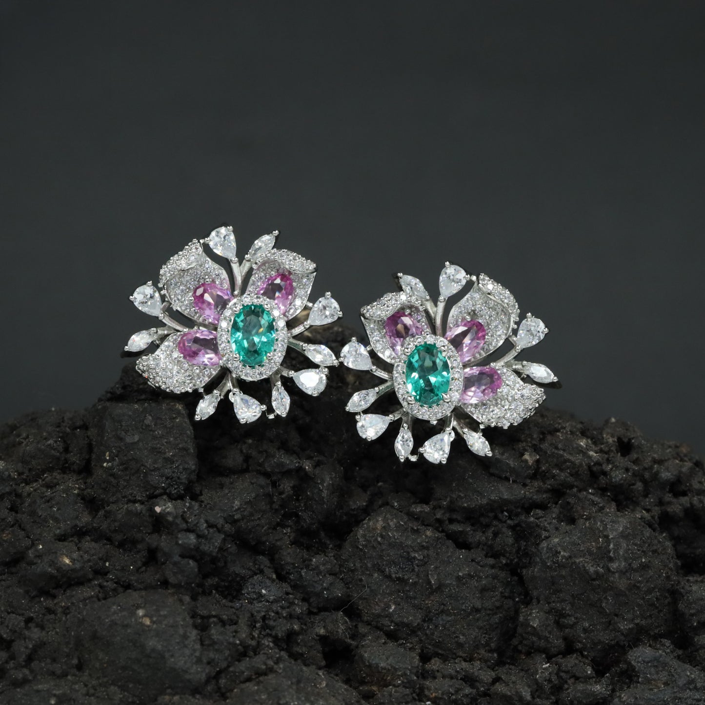 Grand Rhodium Stud Featuring Sculpted Petals, Pointed Leaves and Delicate Drop Accents