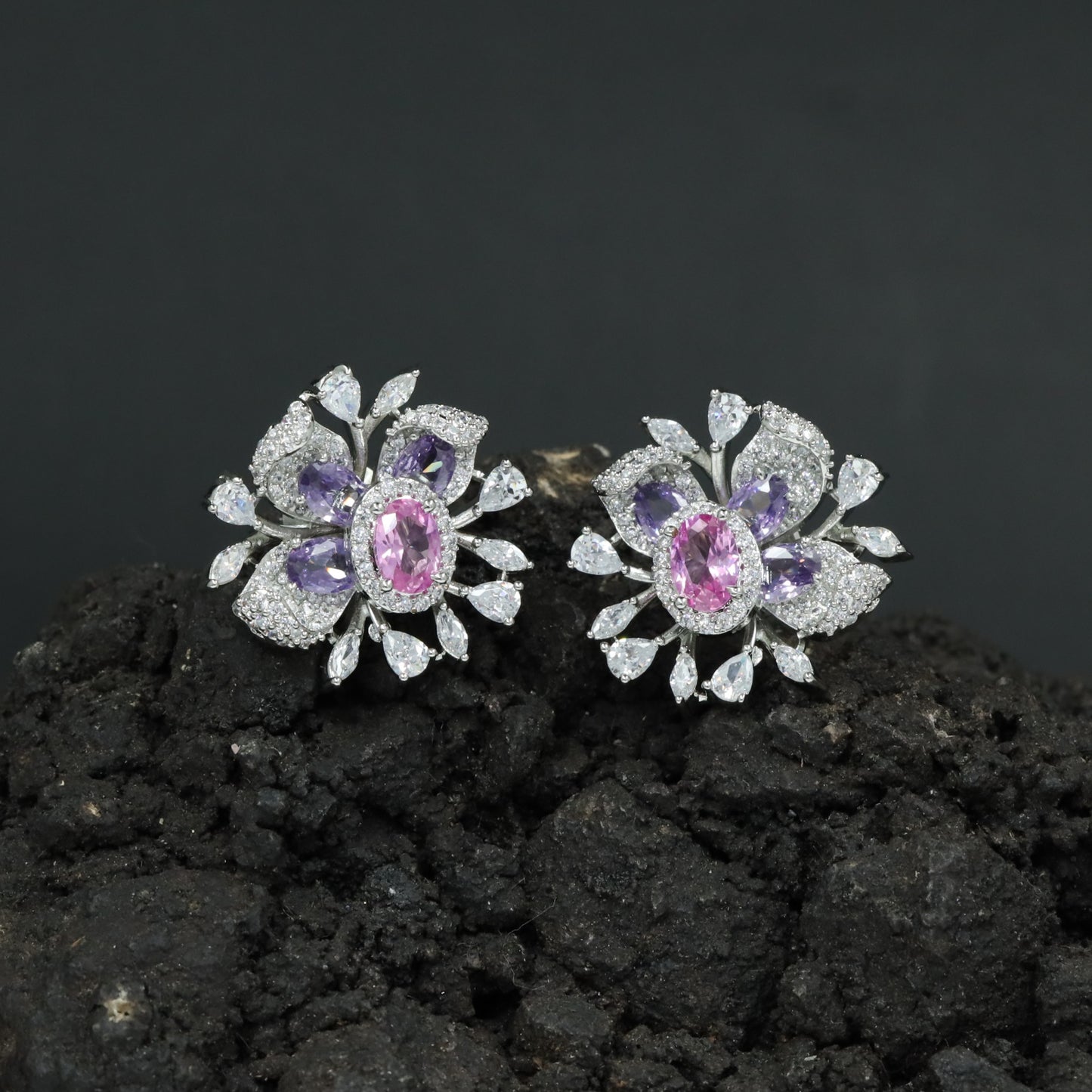 Festive Rhodium Stud Featuring an Ornate Floral Arrangement and Delicate Outer Drops