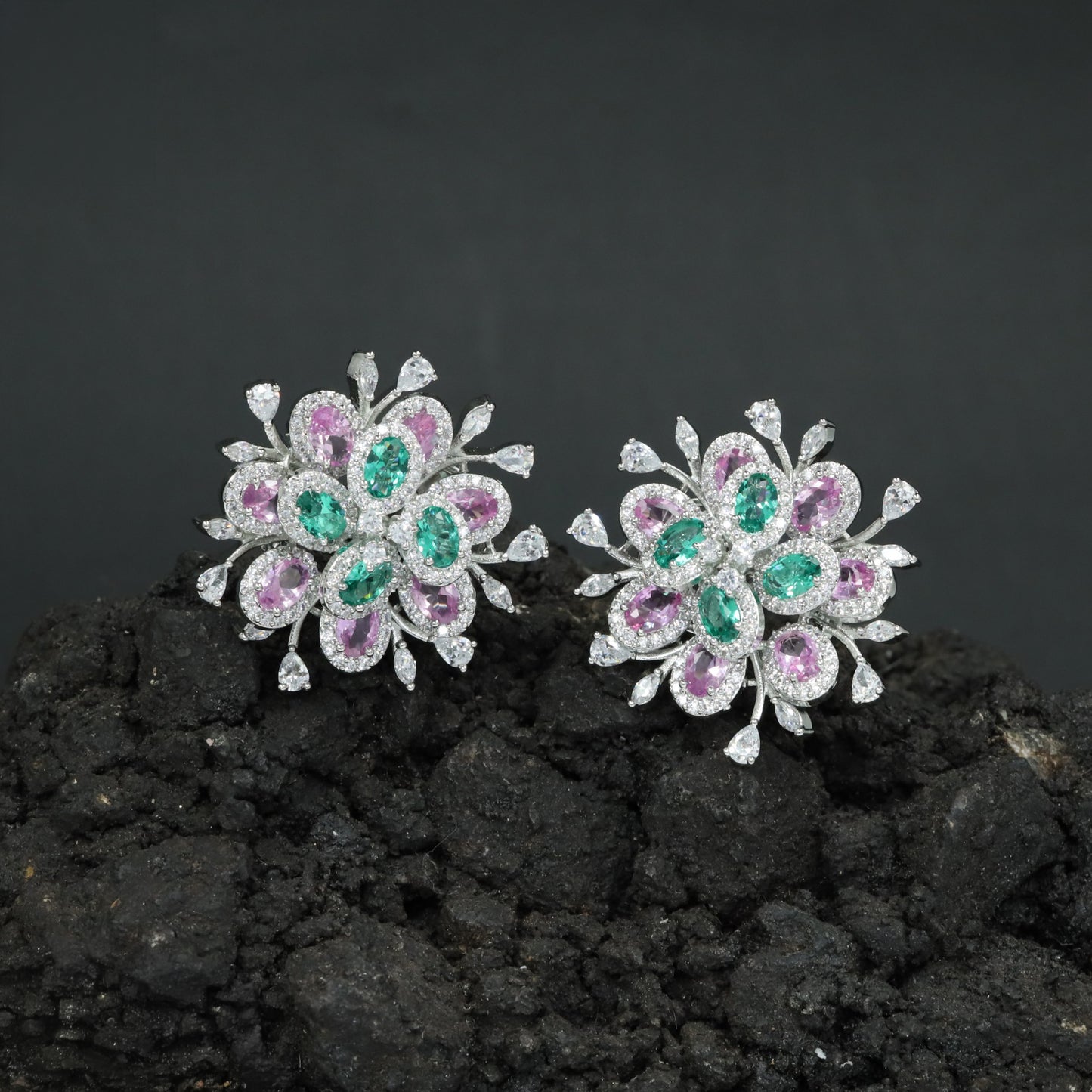 Floral Exclusive Rhodium Stud with Rounded Petal Settings and Radiating Leaf Accents