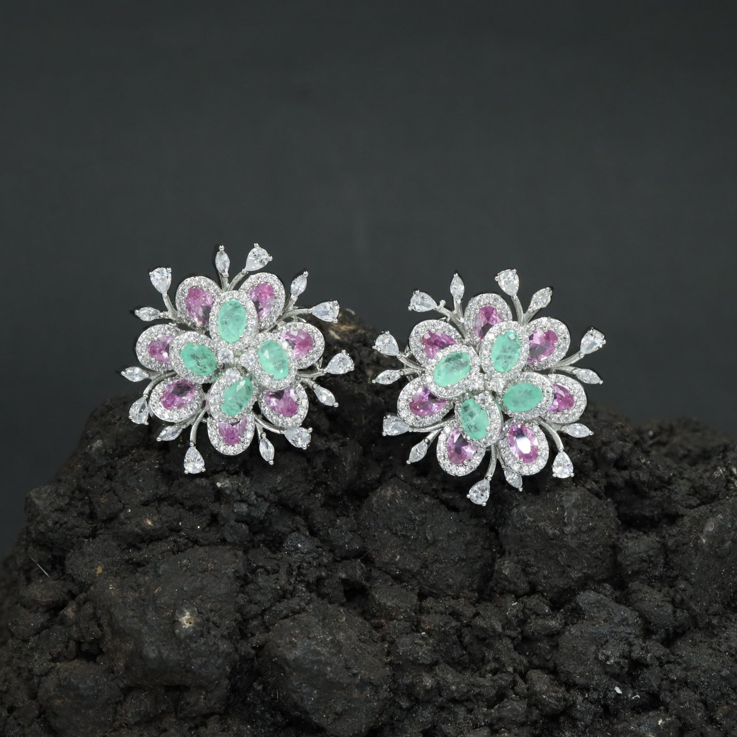 Radiant Rhodium Stud with Oval Centre Settings and Sculpted Floral Petals