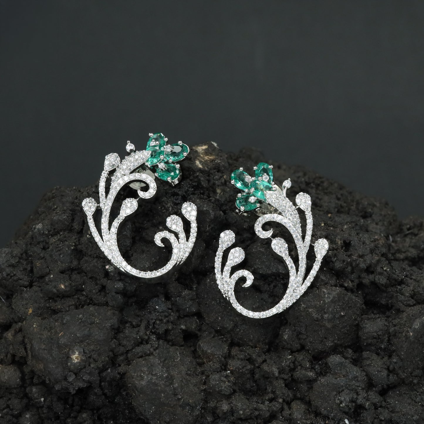 Couture Exclusive Rhodium Stud Featuring Curved Vines and Sculpted Leaf Forms