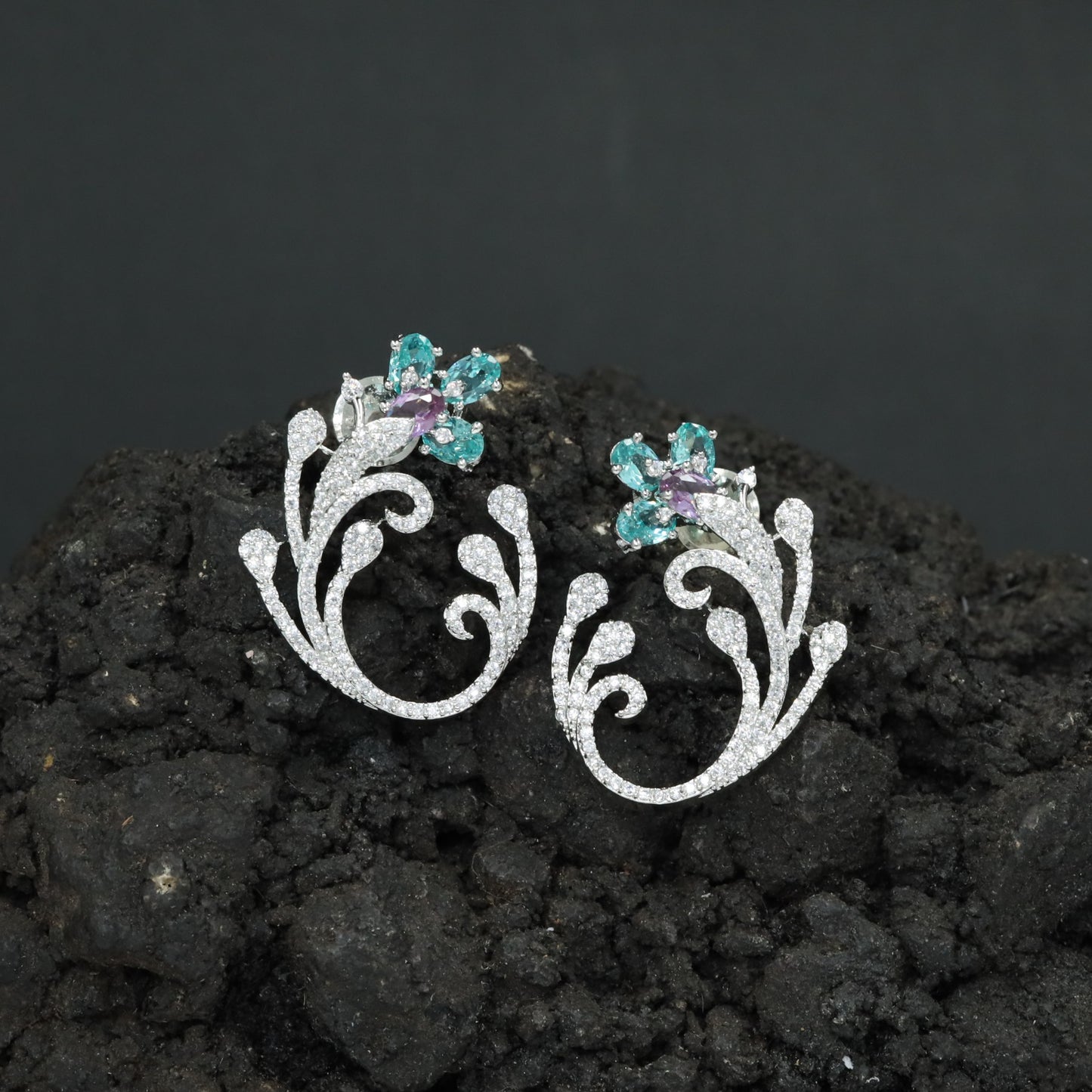 Decorative Floral Stud Earrings with Flowing Scroll Motif