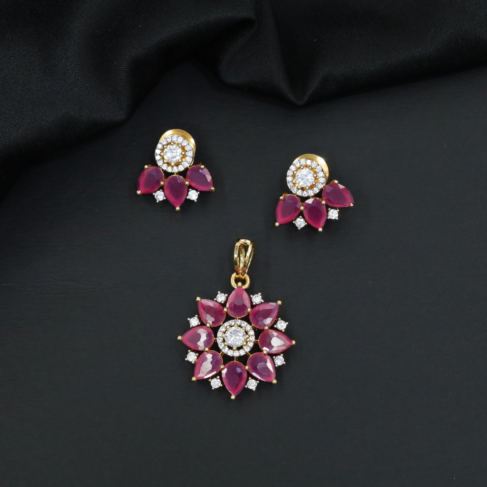 Festive blossom pendant set with petal cluster craftsmanship