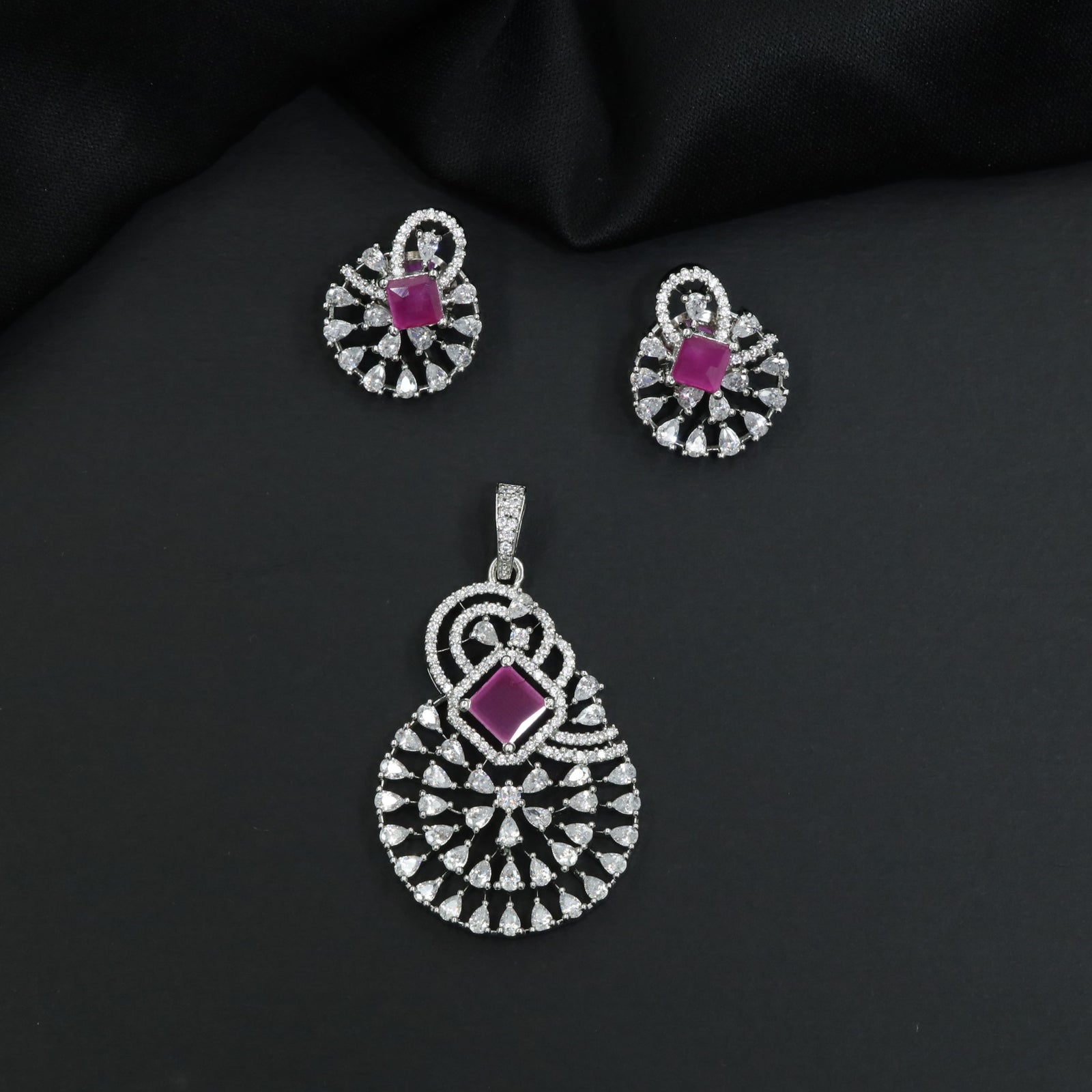 Statement drop pendant set with fan motif construction and matching earrings