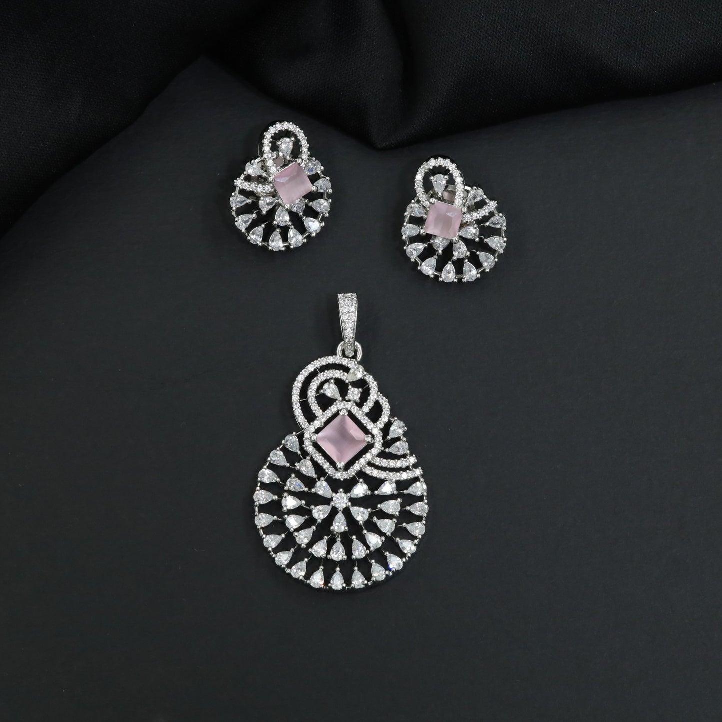 Statement drop pendant set with fan motif construction and matching earrings