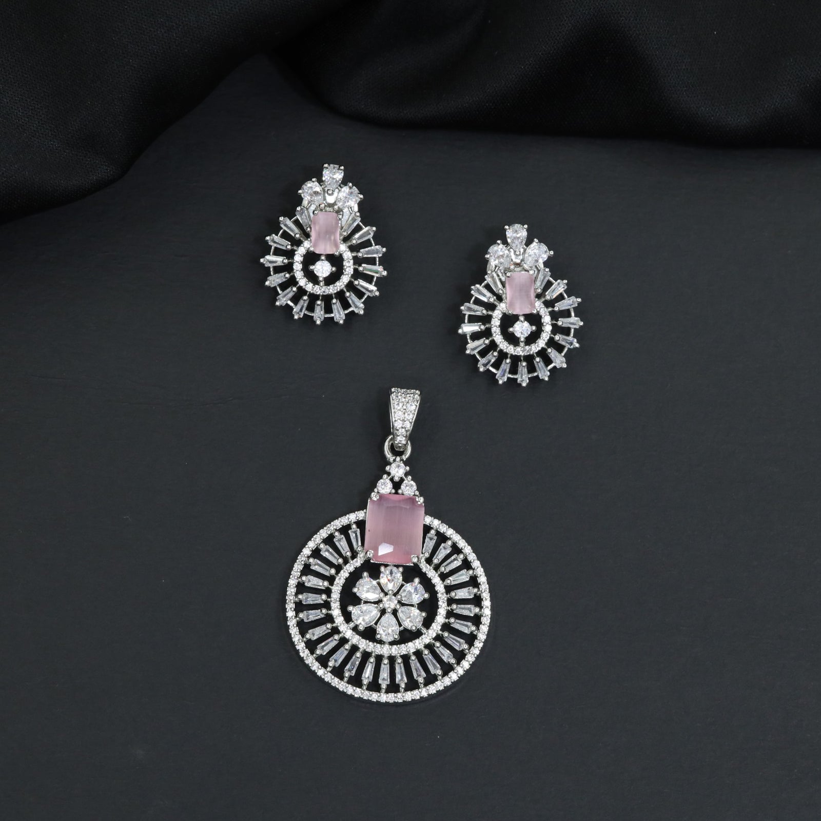 Classic circular pendant set with detailed medallion styling