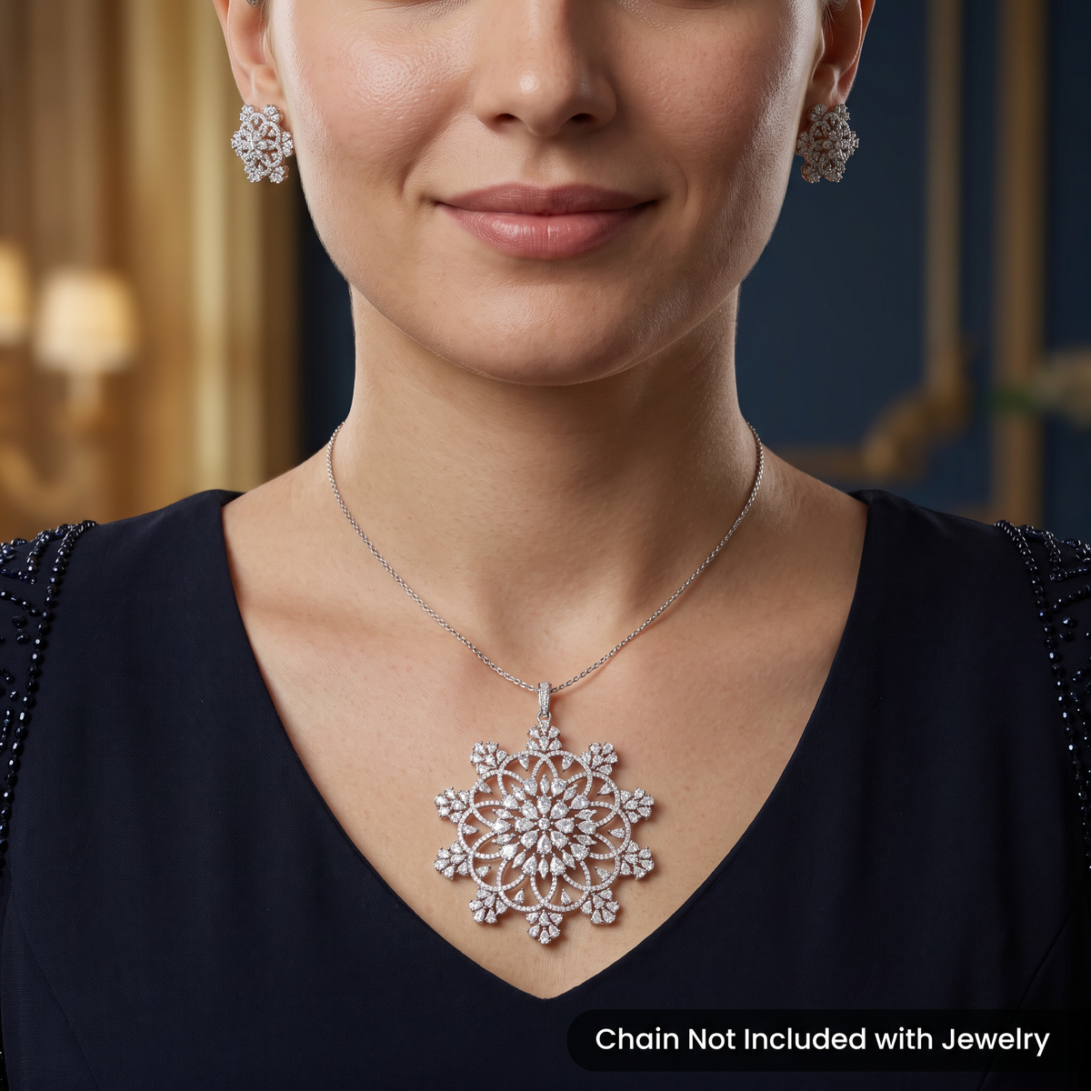 Mandala-inspired pendant set with intricate openwork pattern and floral accents
