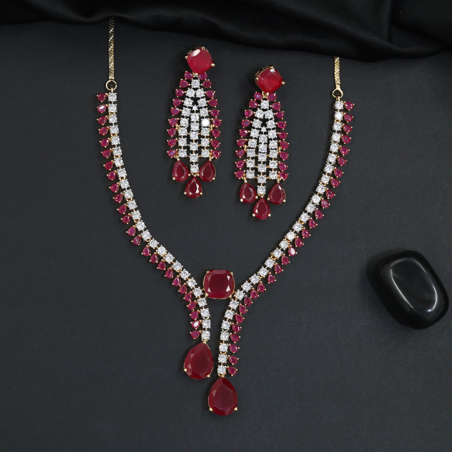 Modern sleek teardrop accent bridal Gj necklace featuring tiered stone settings