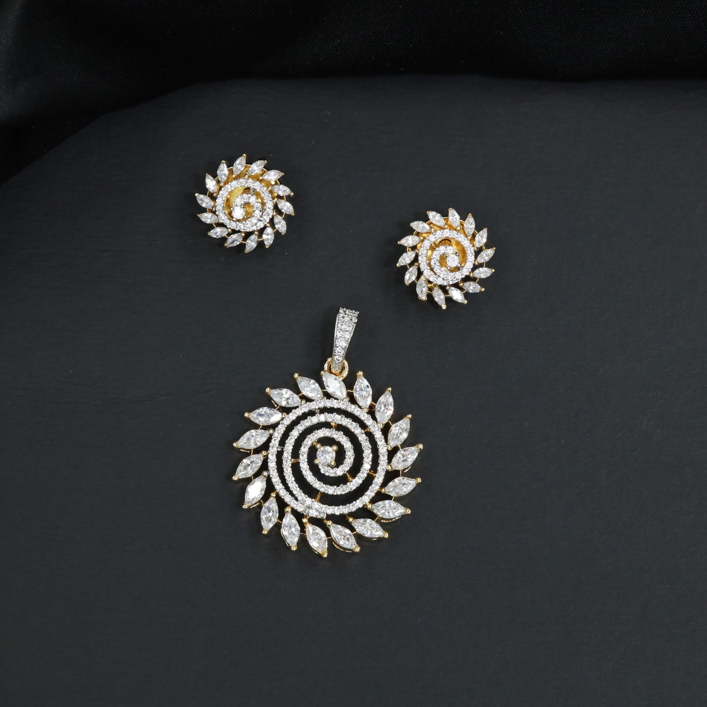 Classic pendant set with spiral centerpiece composition