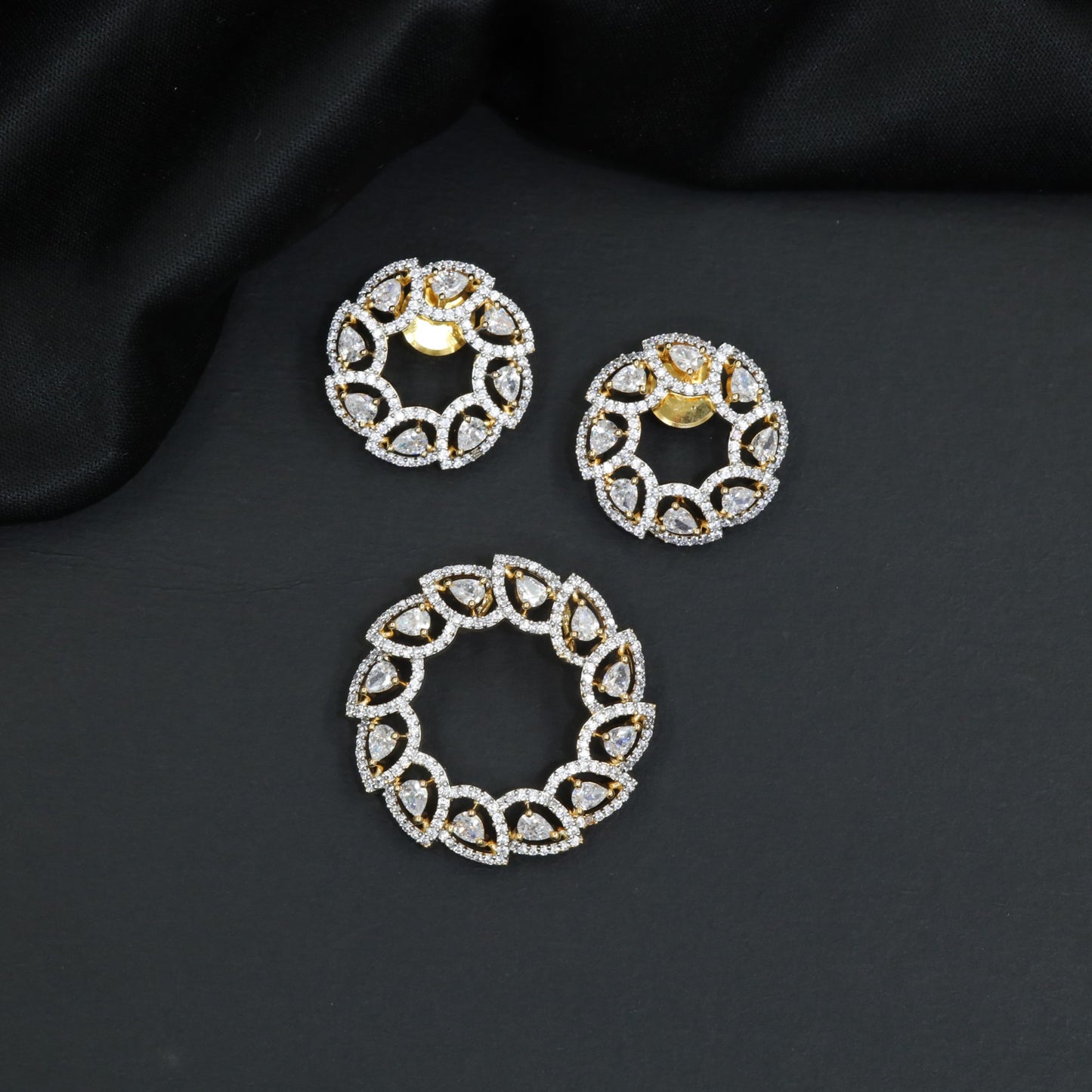 Elegant white stone open circle wreath pendant set with matching round studs