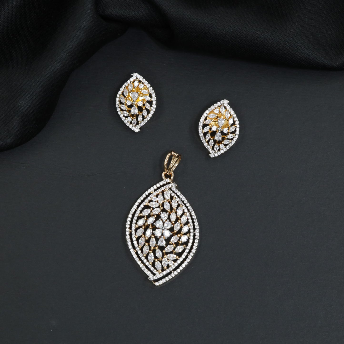 Beautiful stone studded medallion pendant set with marquise vine lattice
