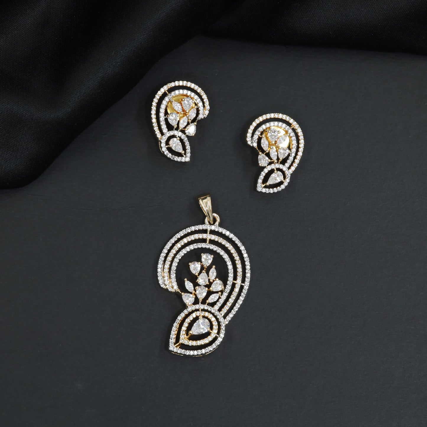 Curved Teardrop Pendant Set with Bloom Inspired Details