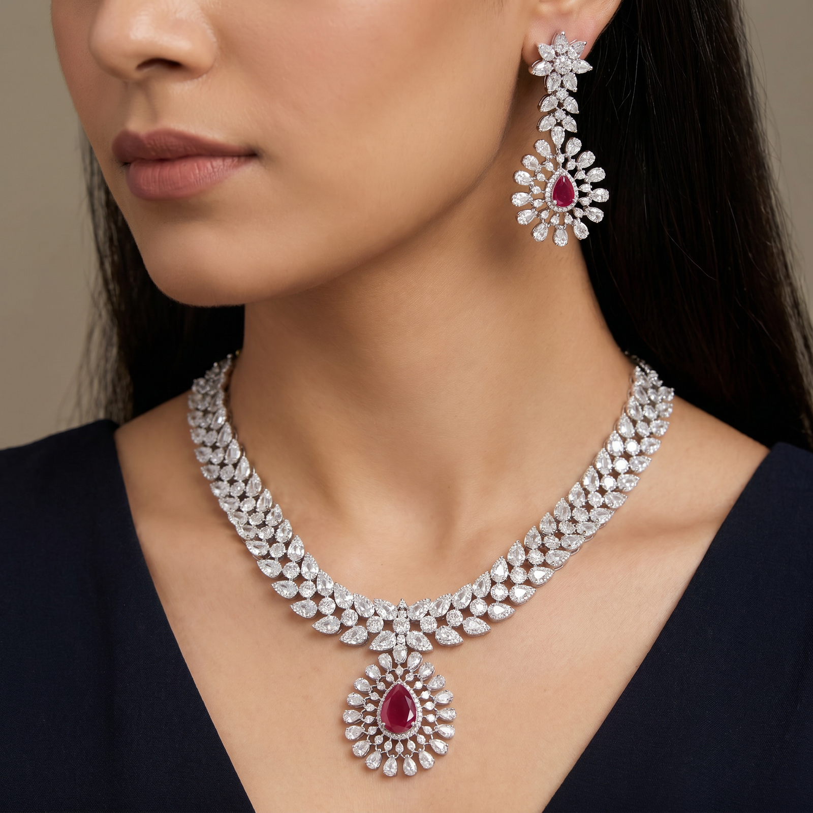 Collector's edition rhodium necklace set with radiant station detailing