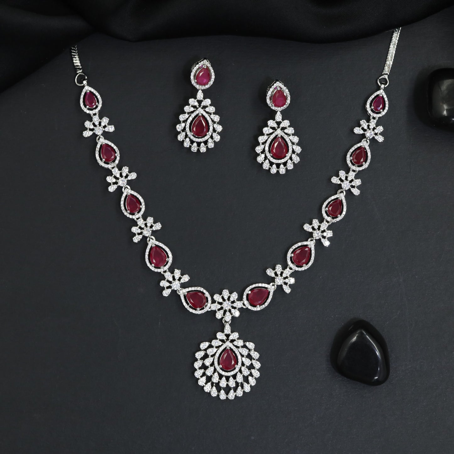 Occasion wear rhodium necklace set with radiant drop earrings