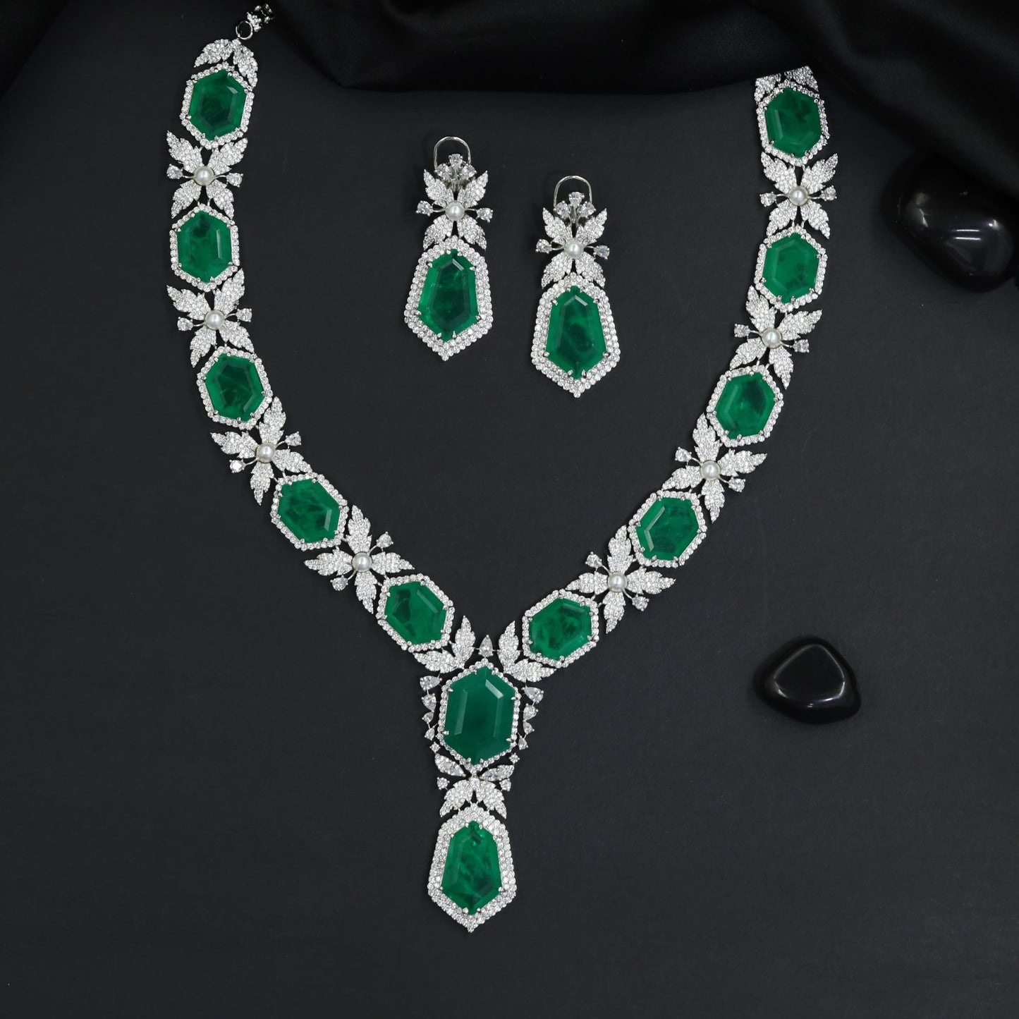 Traditional hexagonal link rhodium necklace with an elongated shield pendant