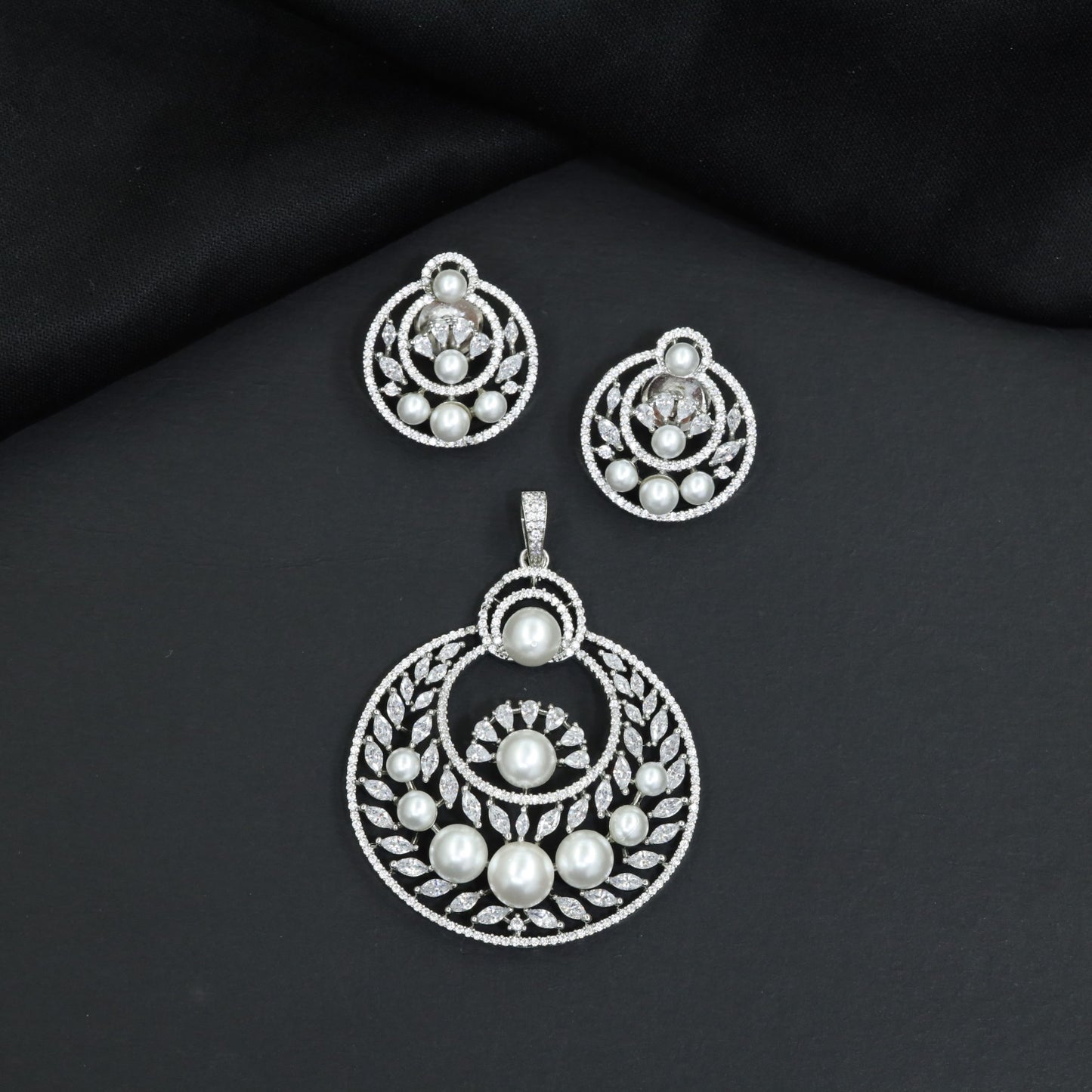 Festive Pendant Set with Openwork Design and Matching Earrings