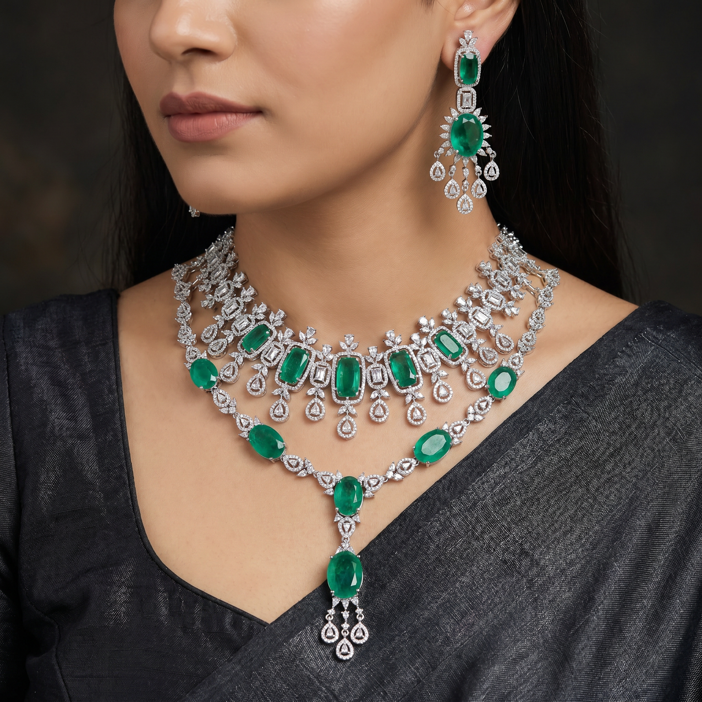 Elegant rhodium necklace featuring cascading stone accents