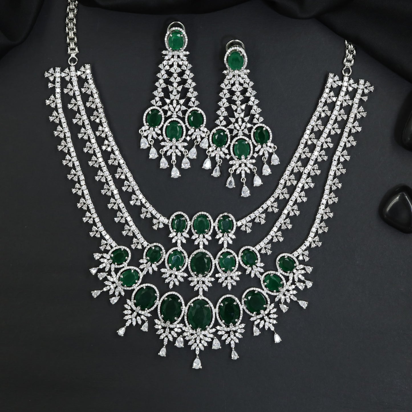 Festive Triple Strand Rhodium Necklace Set with Scalloped Drop Accents