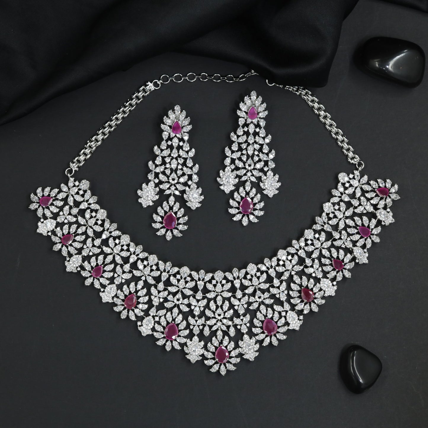 Elevated rhodium necklace featuring ornamental gemstone artistry