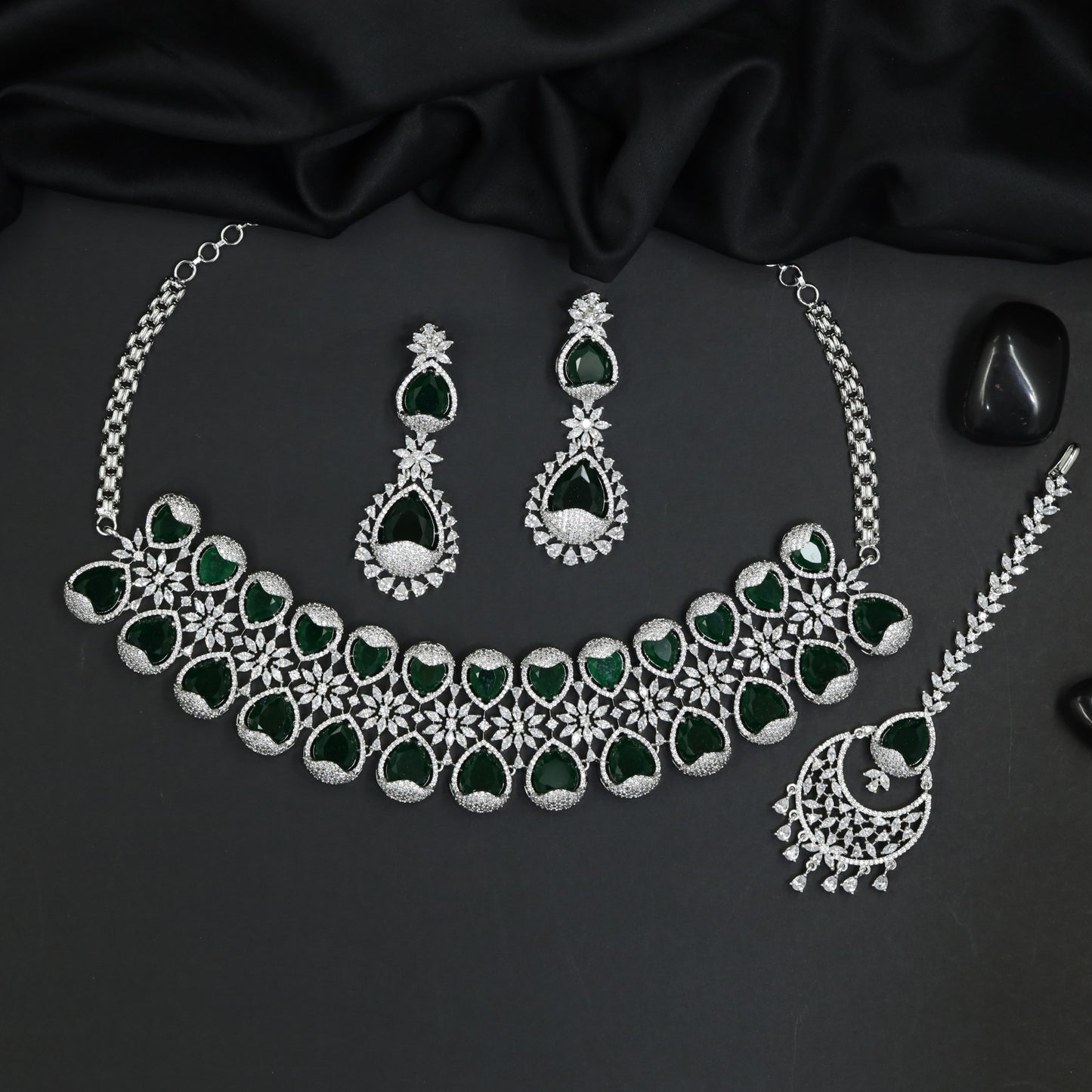 Sleek rhodium choker showcasing structured cascade framework