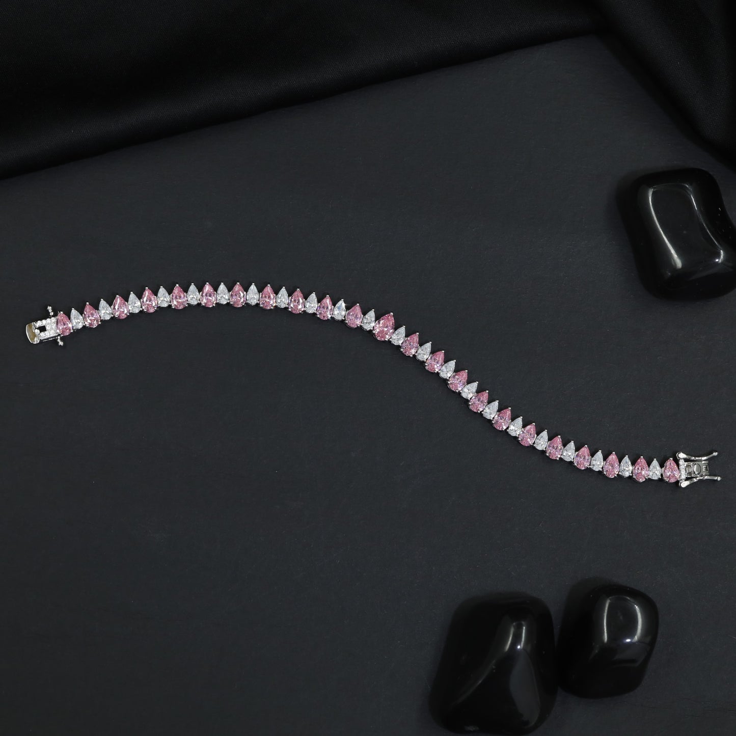 Rhodium Bracelet with Linked Leaf Elements and Graceful Silhouette