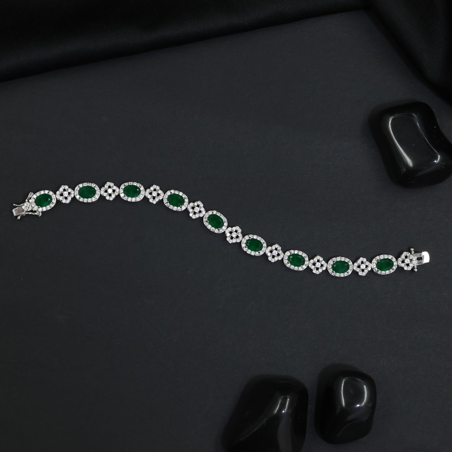 Rhodium Bracelet with Repeating Rosette Elements and Circular Links