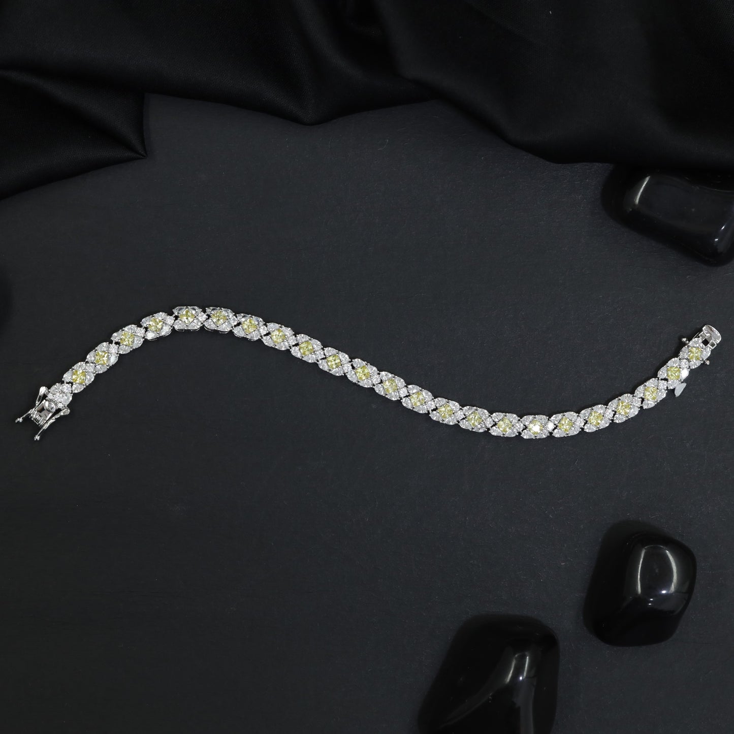 Rhodium Bracelet with Balanced Chevron Arrangement and Floral Details