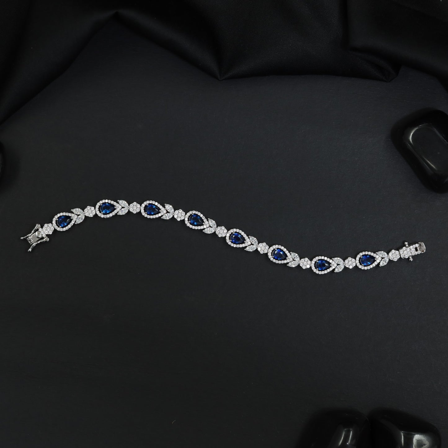 Rhodium Statement Bracelet Featuring Leaf Links and Cluster Elements