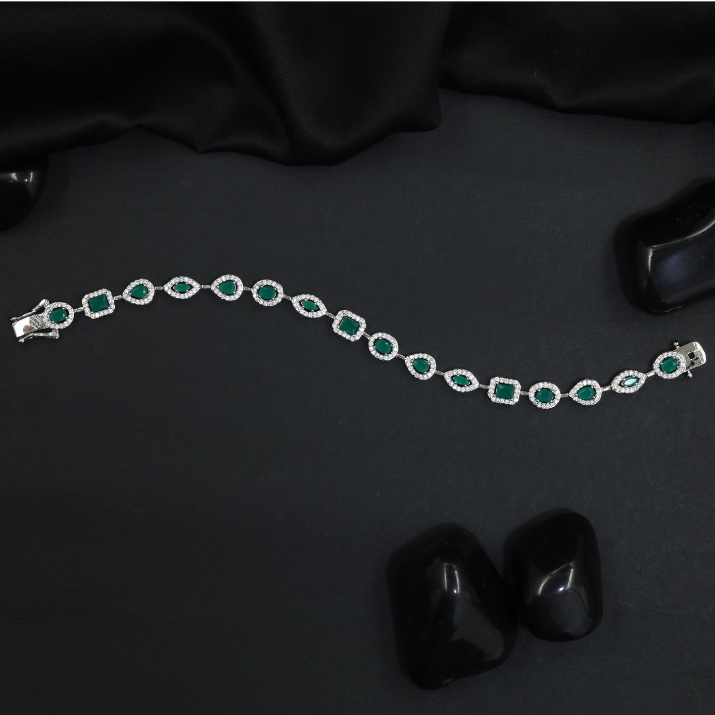 Refined rhodium bracelet with radiant bordered panels