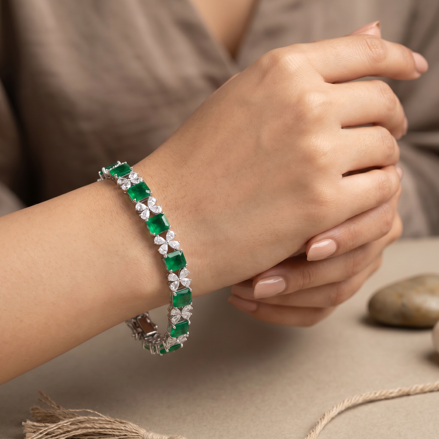 Radiant rhodium bracelet with ribbon‑style silhouettes