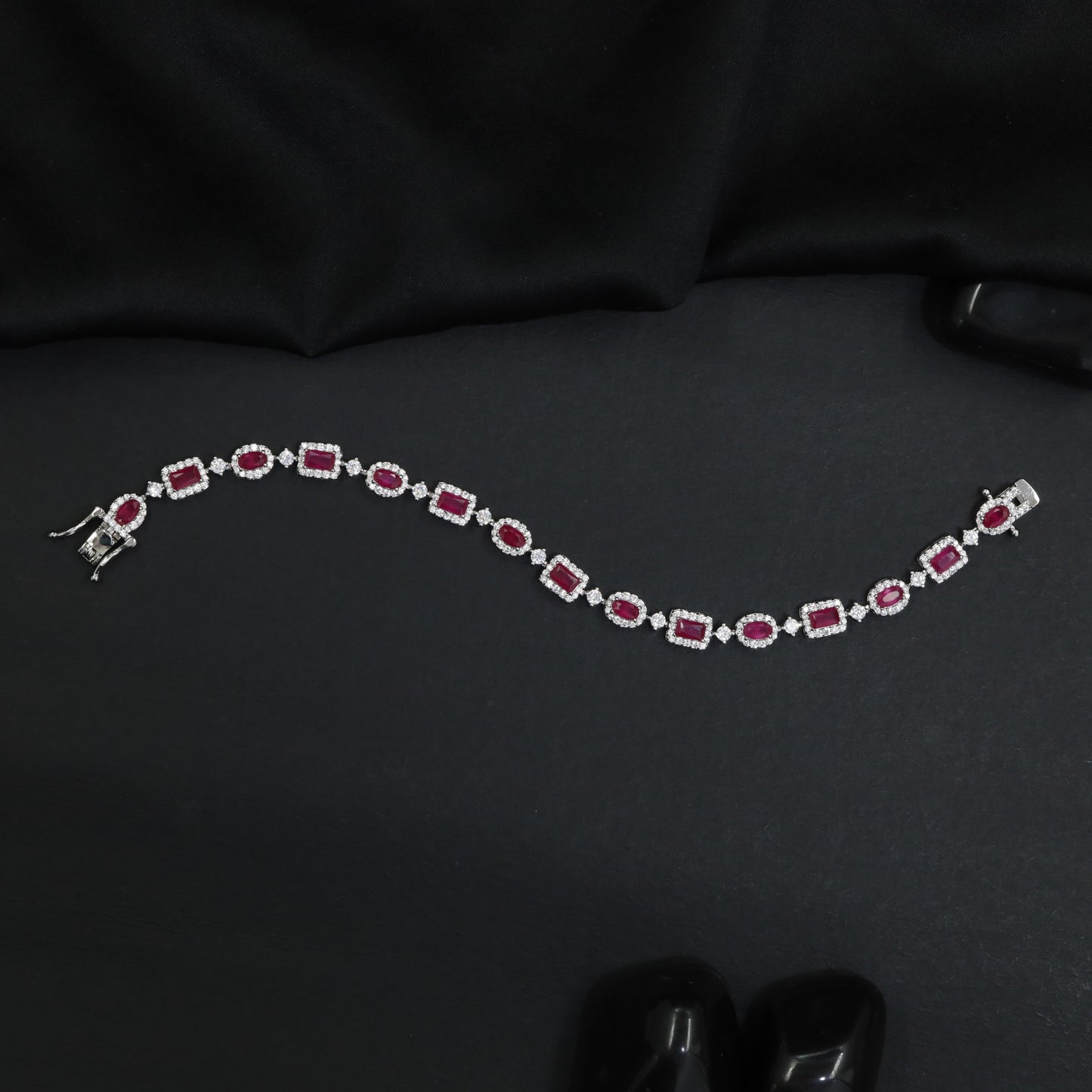 Glam rhodium bracelet with ornamental oval and rectangular artistry