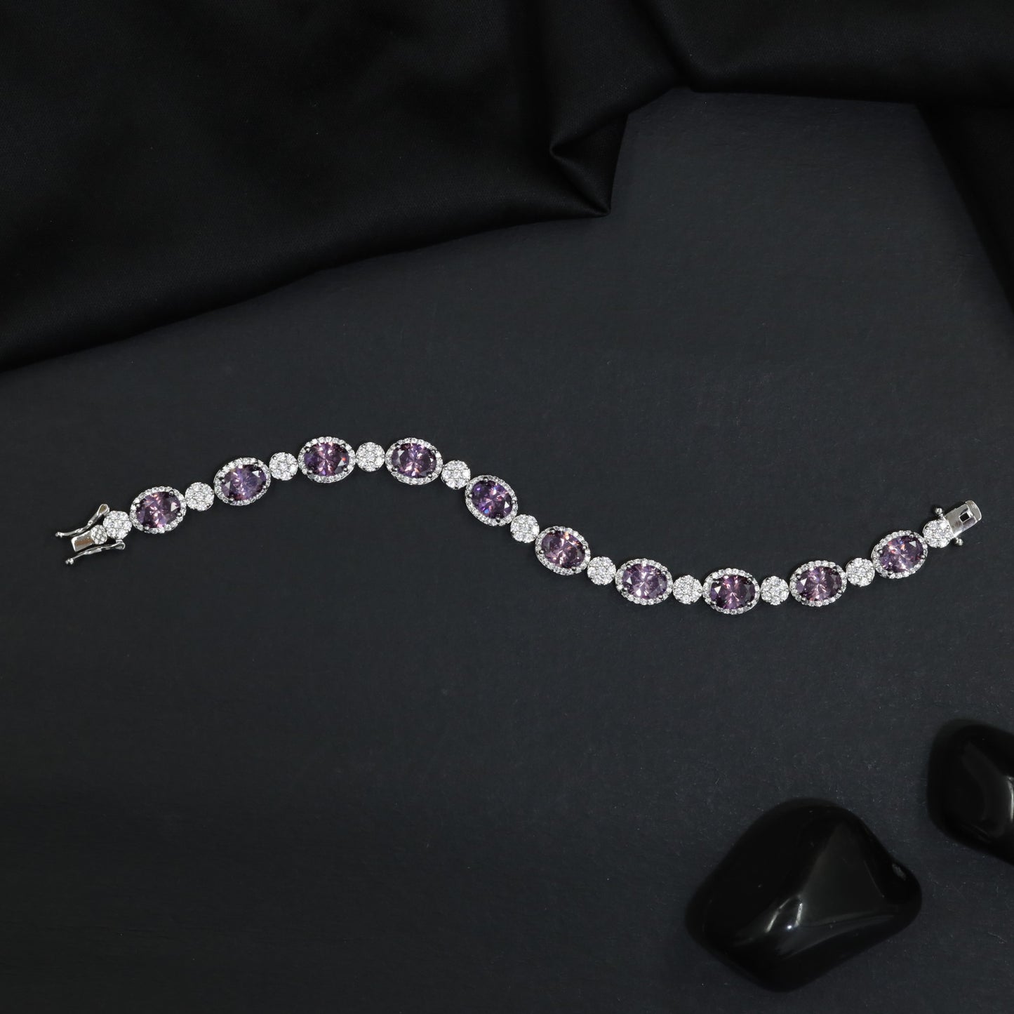 Rhodium Bracelet with Linked Oval Stations and Intricate Borders