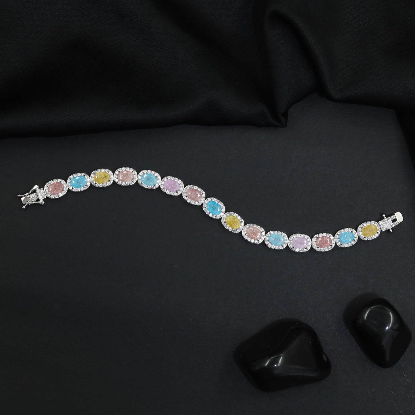 Rhodium Bracelet with Oval Halo Stations in a Classic Link Design