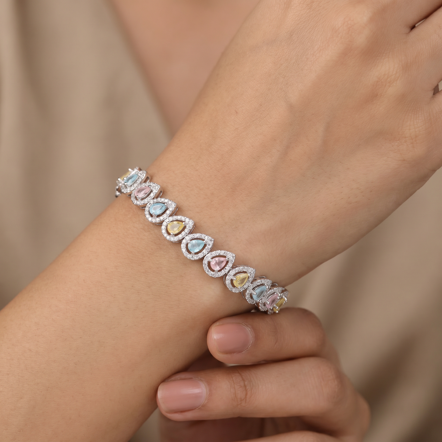 Rhodium Bracelet with Pear Shape Halo Link Design
