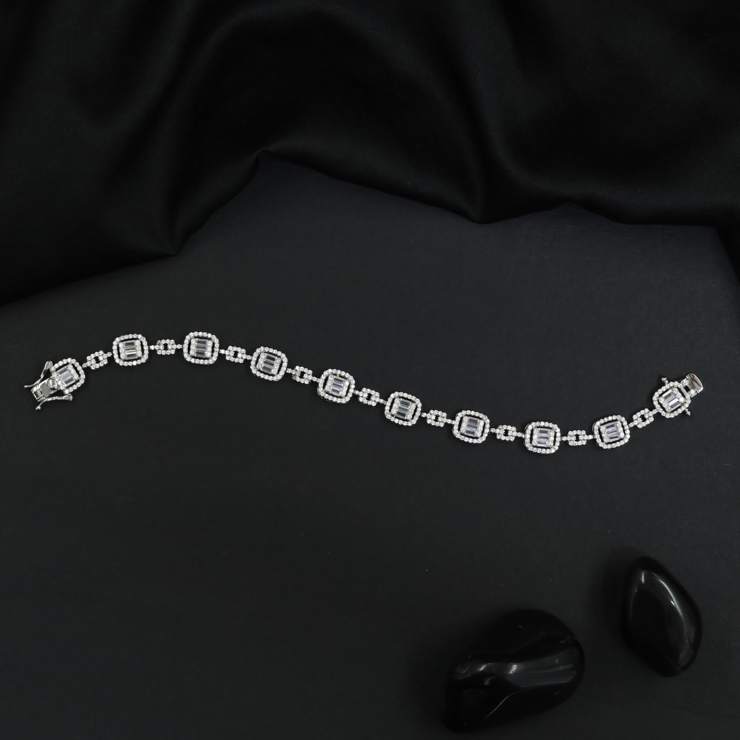 Sophisticated Rhodium Bracelet with Decorative Square Design