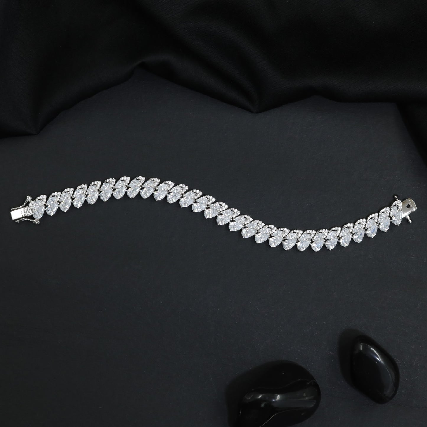 Rhodium Bracelet with Layered Crystal Leaf Arrangement