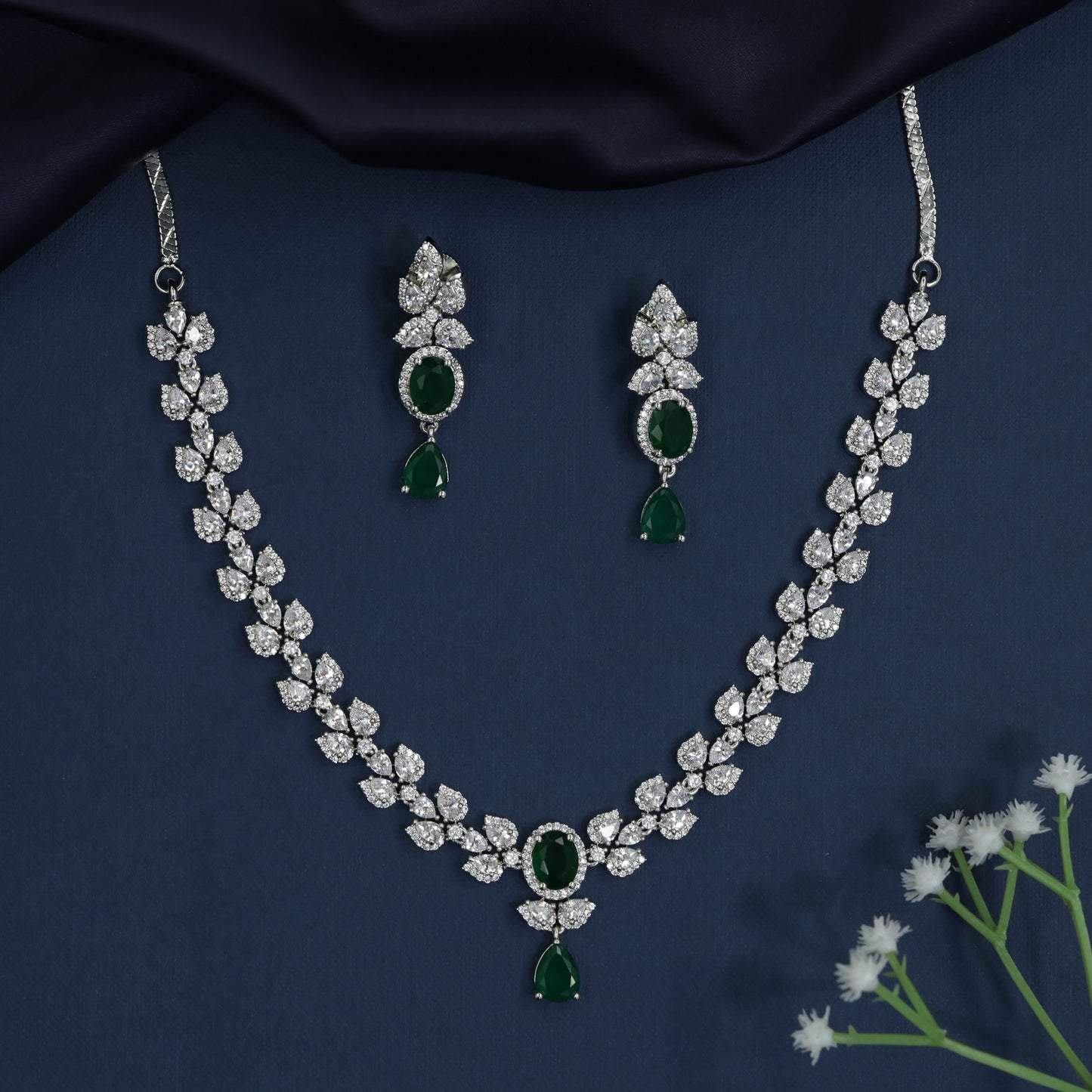 Regal rhodium necklace with layered leaf artistry