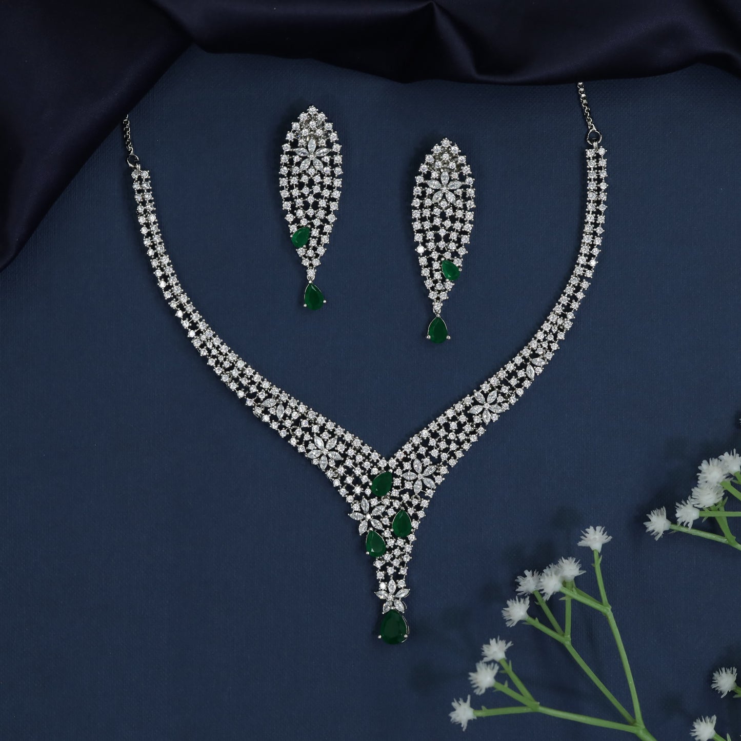 Couture rhodium necklace showcasing structured pendant framework