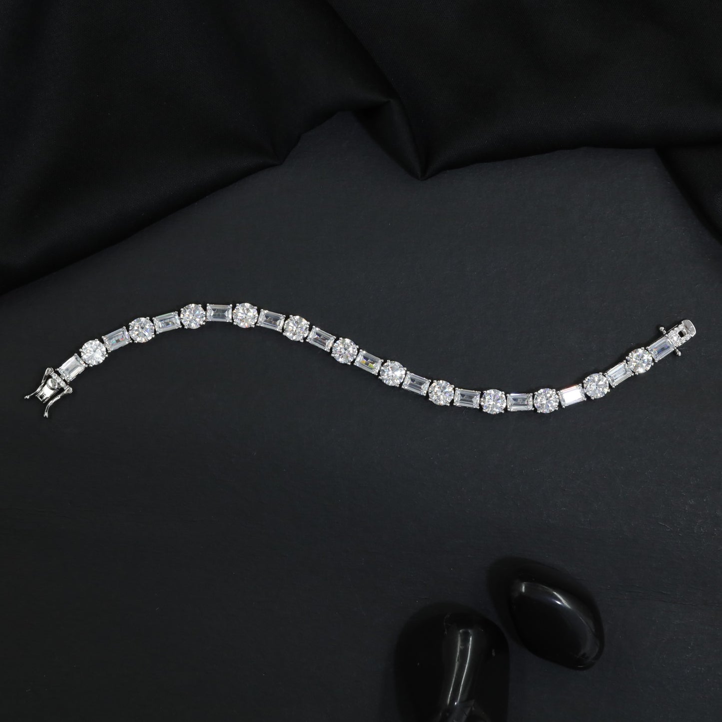 Rhodium Bracelet Featuring Rectangular and Floral Links