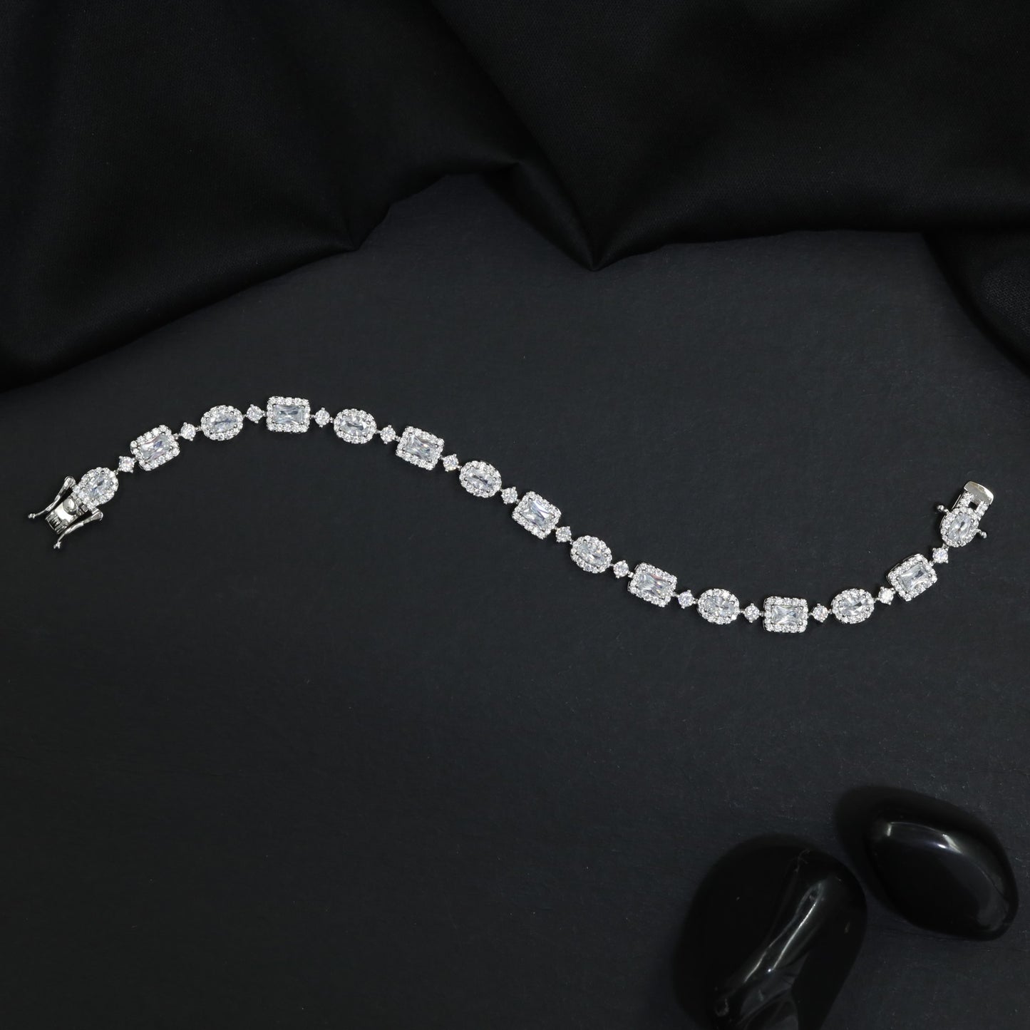 Rhodium Bracelet with Alternating Cushion and Floral Motifs