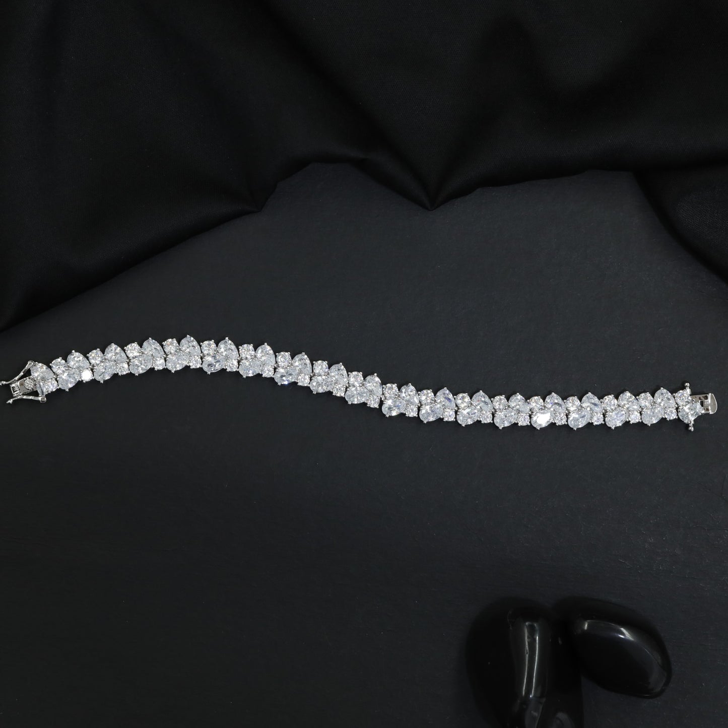 Rhodium Bracelet with Repeating Pear Cluster Arrangement