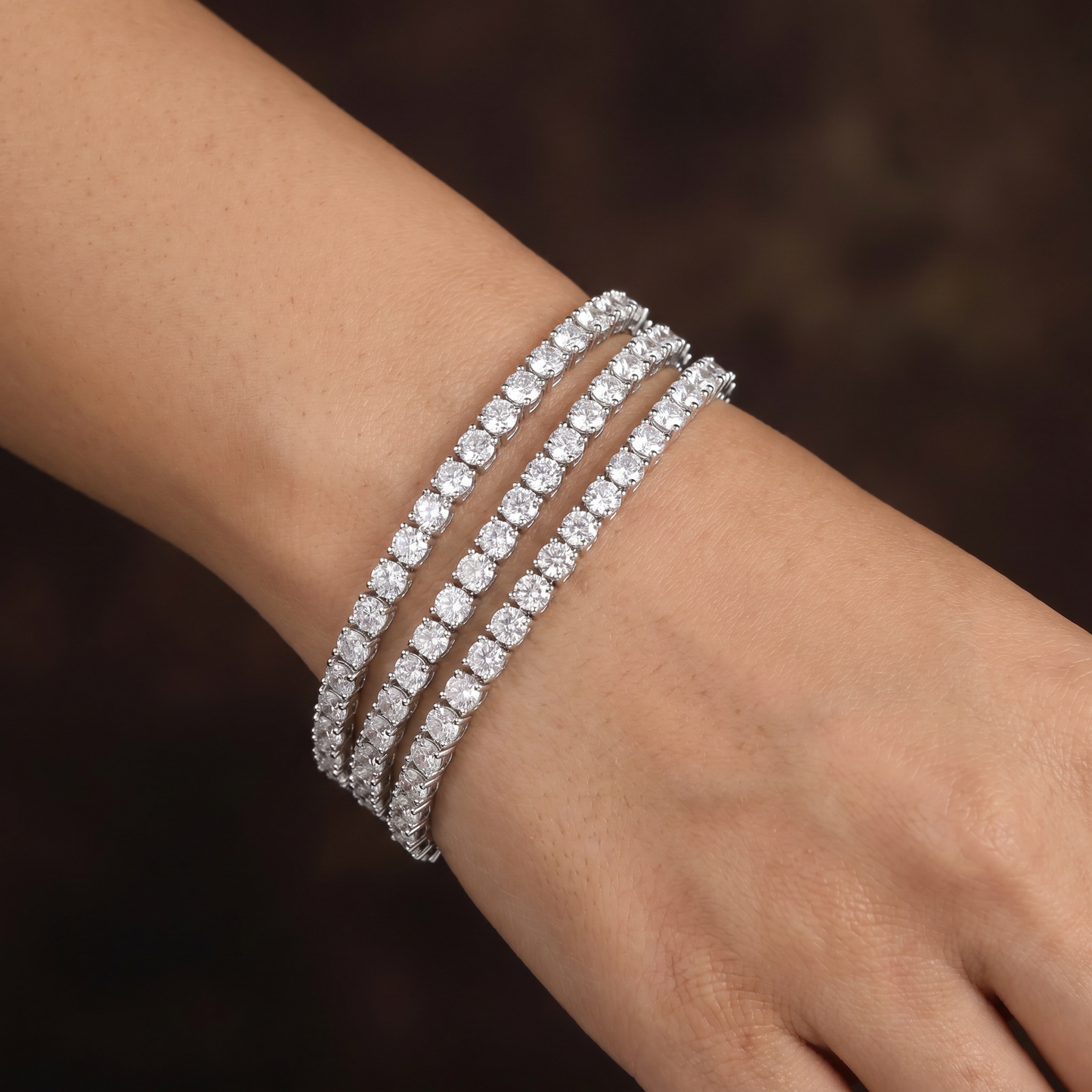 Rhodium Bracelet Featuring Three Strand Floral Clusters