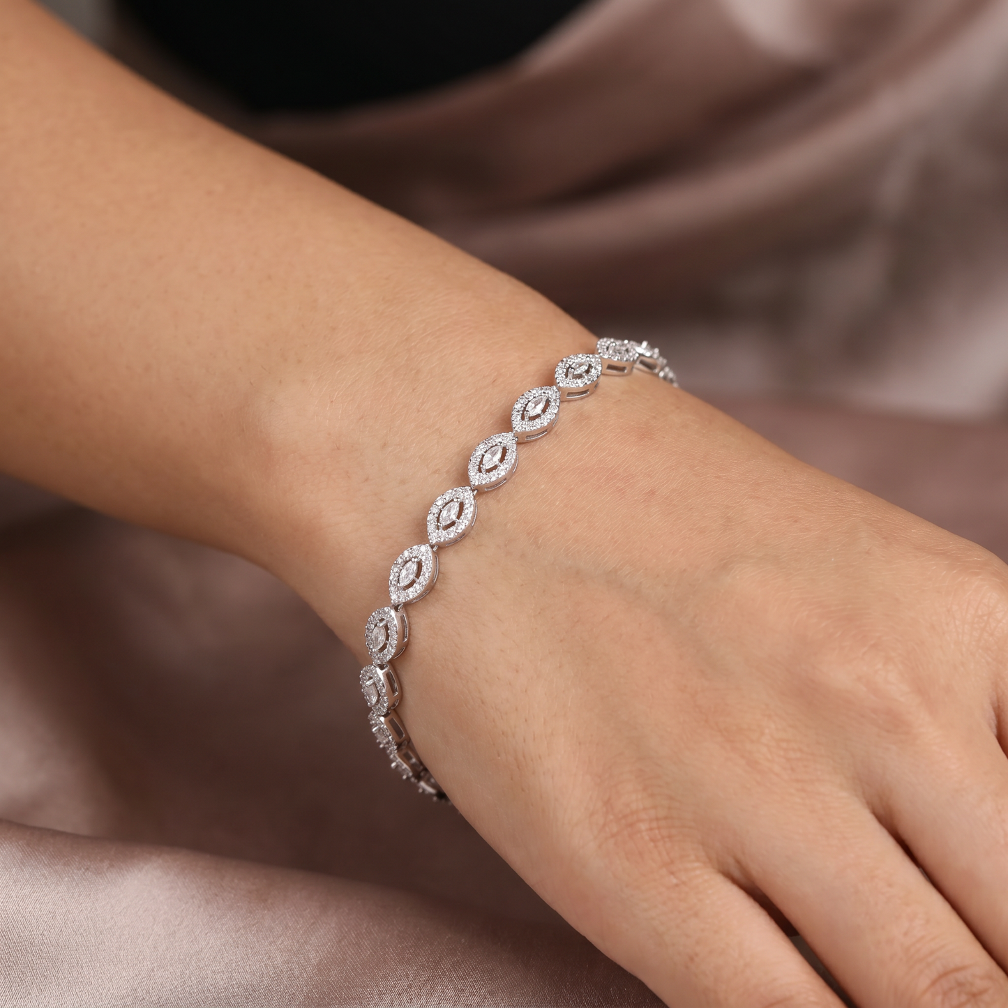 Rhodium Bracelet Showcasing Repeating Marquise Motifs